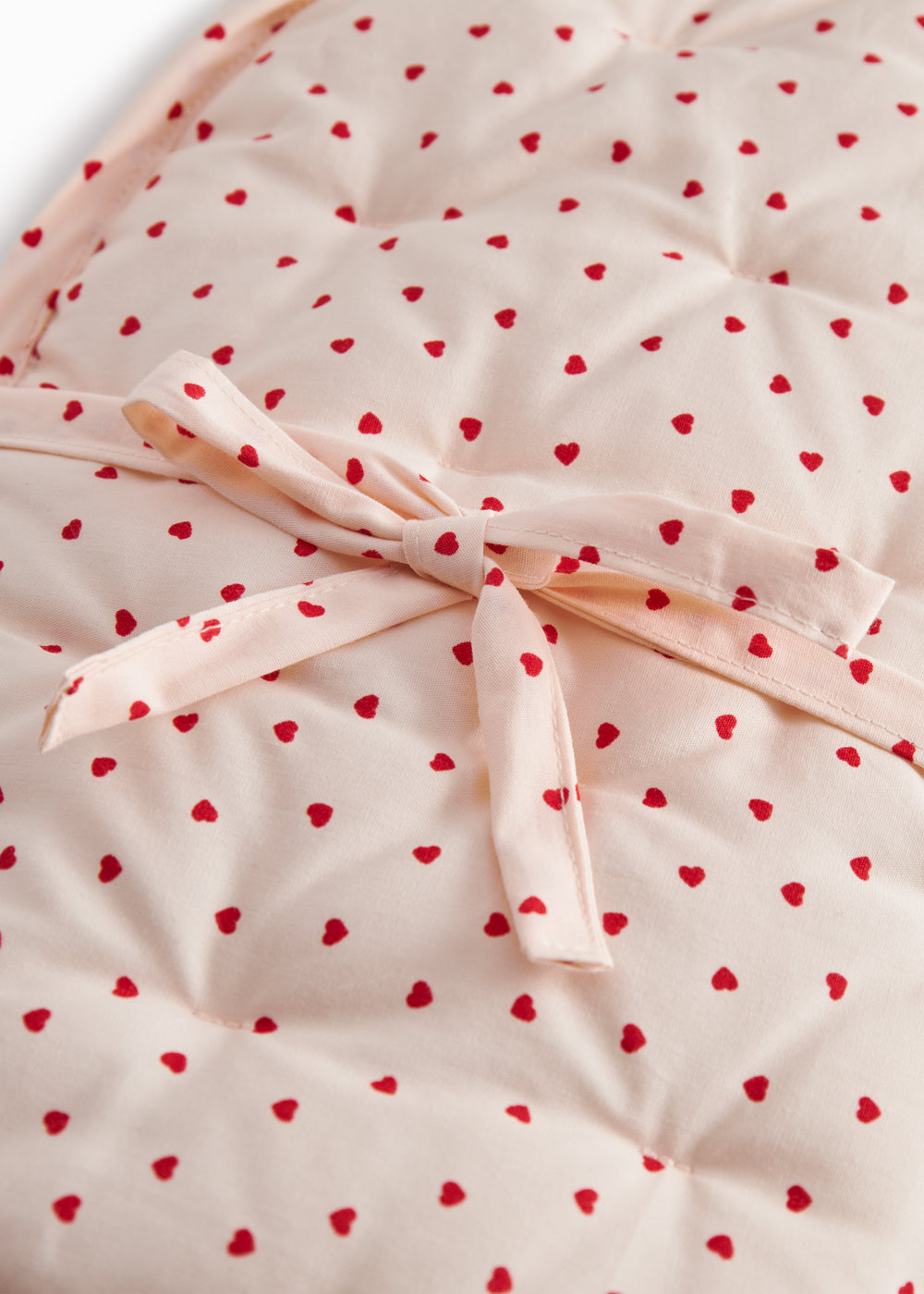 Pusleunderlag med et fint hjerte print