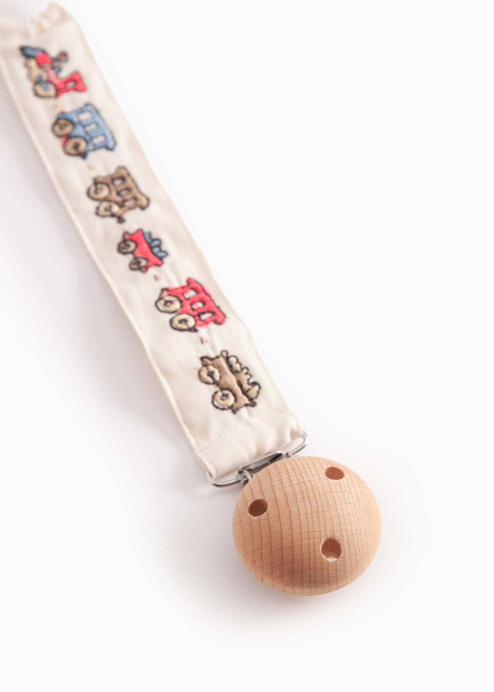 Suttesnor med gummiring, træ/metalklips og togmønster