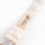 Suttesnor med gummiring, træ/metalklips og togmønster