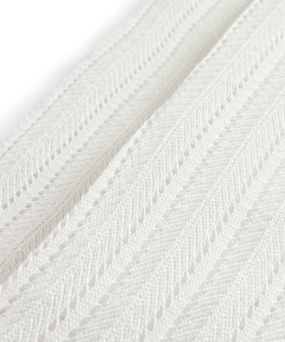 Ribstrikkede strømpebukser til små børn i cremefarvet bomuld