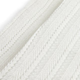 Ribstrikkede strømpebukser til små børn i cremefarvet bomuld