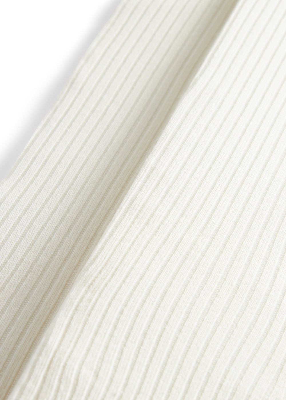 Ribstrikkede strømpebukser i cremefarvet bomuld til børn