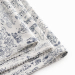 Baby tæppe med Moomin print, rundede hjørner og picotkanter