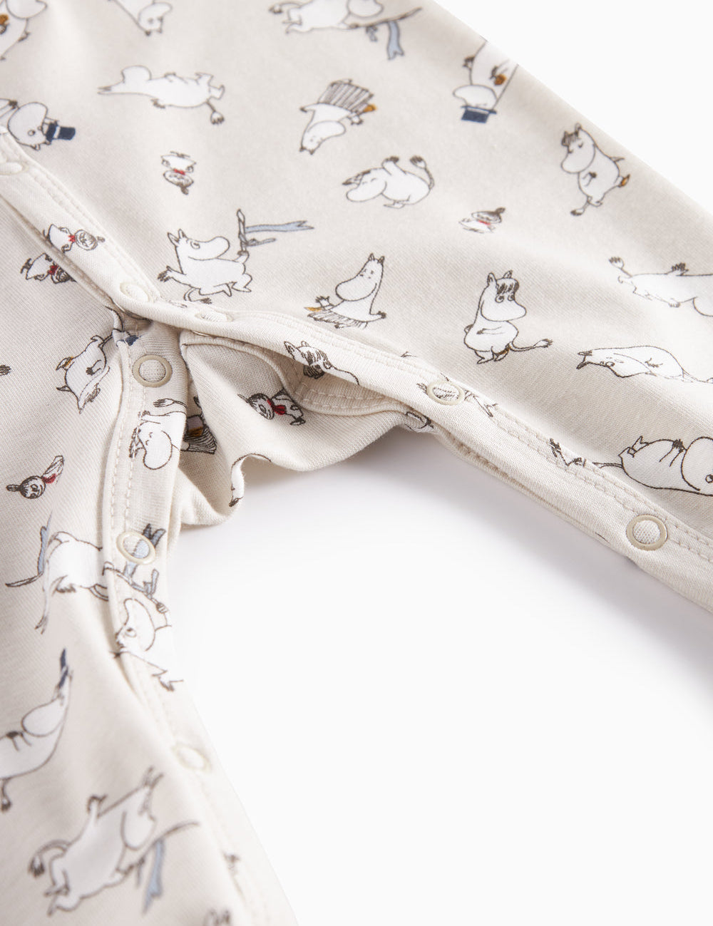 Heldragt til baby med lange ærmer, trykknapper, futter og Moomin-tryk i lyse farver