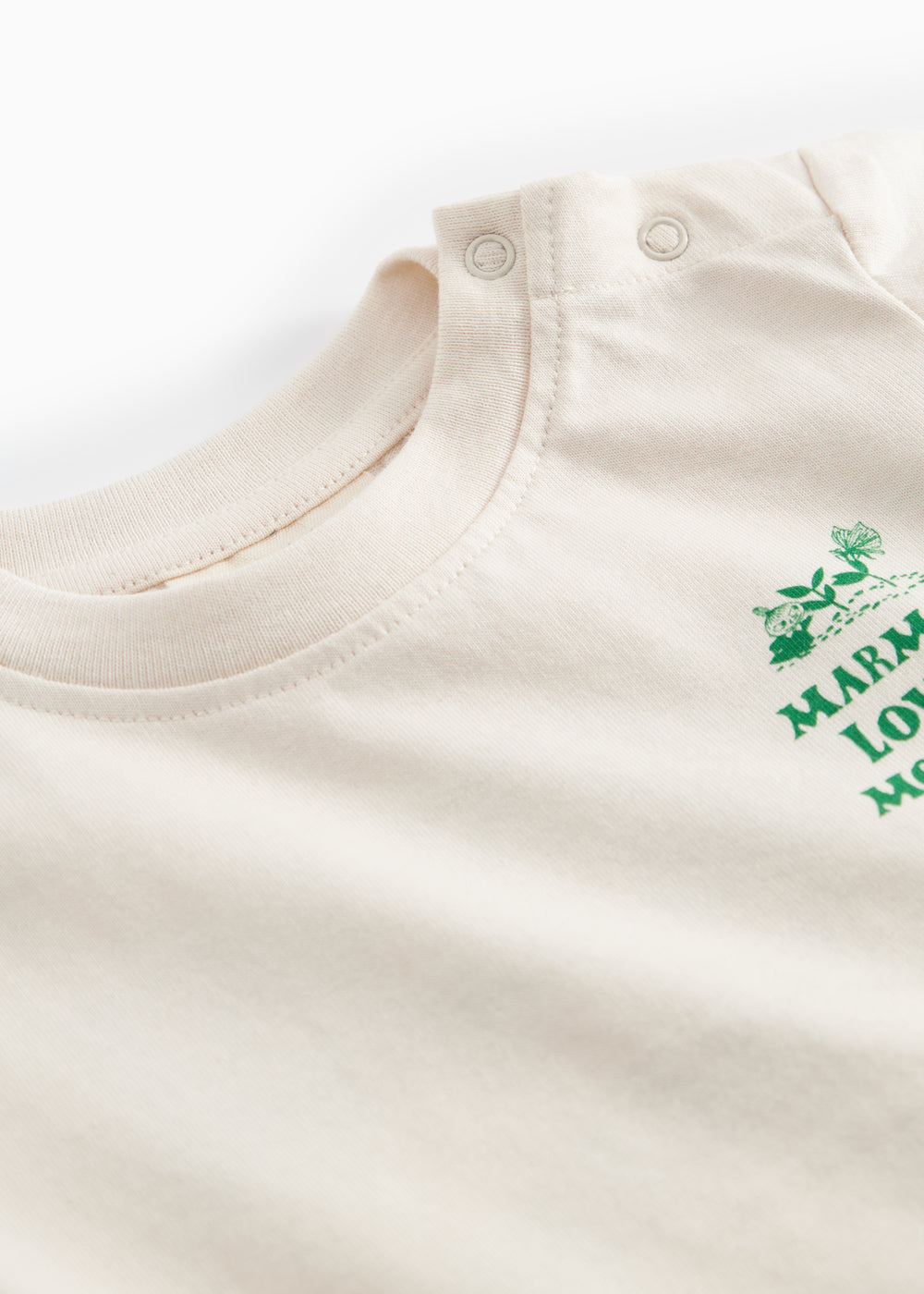 Råhvid T-shirt med grønt Moomin print til baby