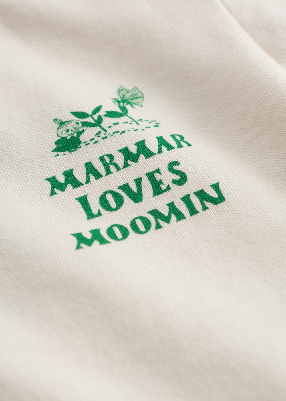 Råhvid T-shirt med grønt Moomin print til baby