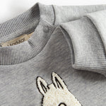 Grå børnetrøje med Moomin print foran