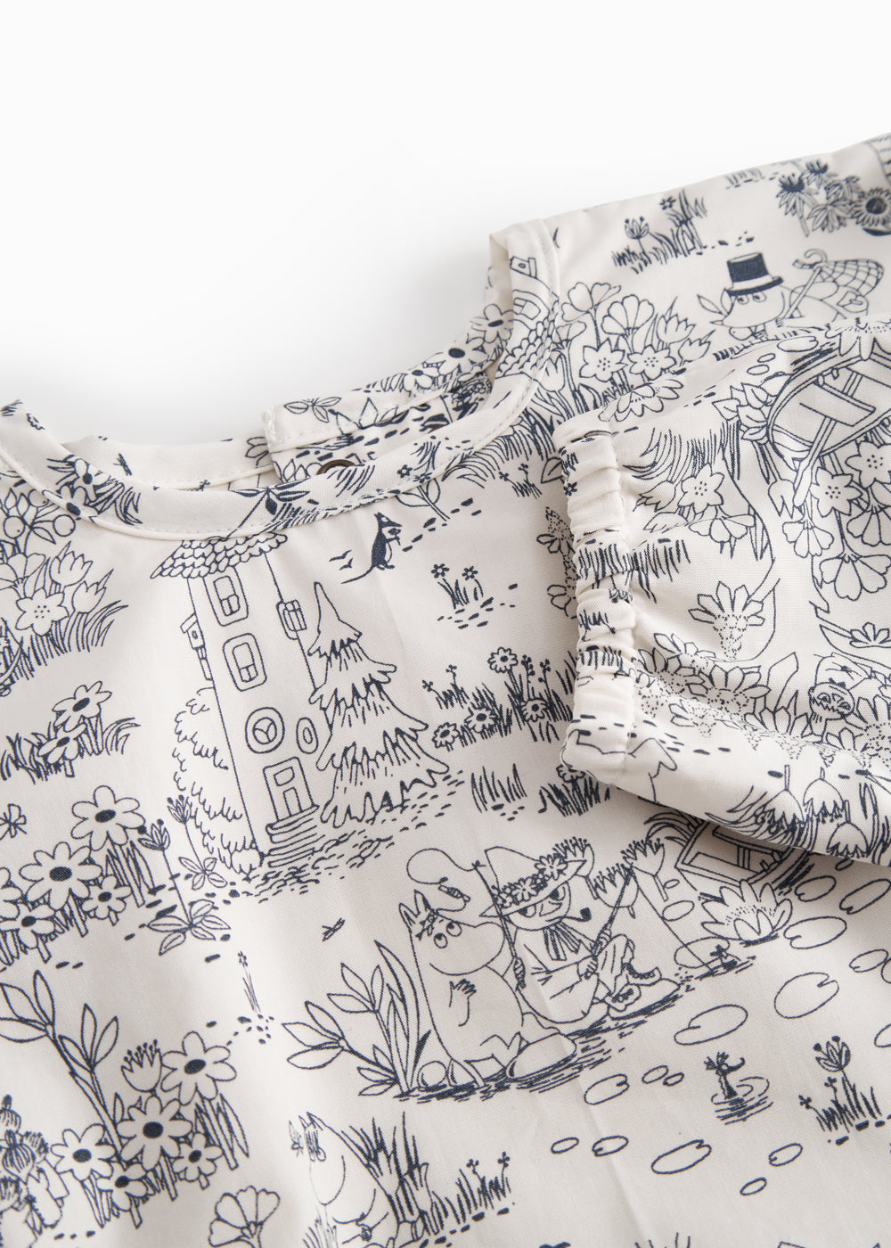 Langærmet spiseforklæde til børn med Moominvalley