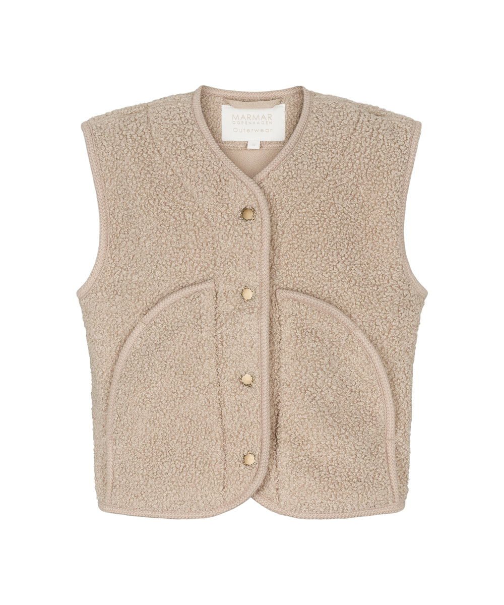 Lys beige teddyvest til børn med knapper og store buede lommer