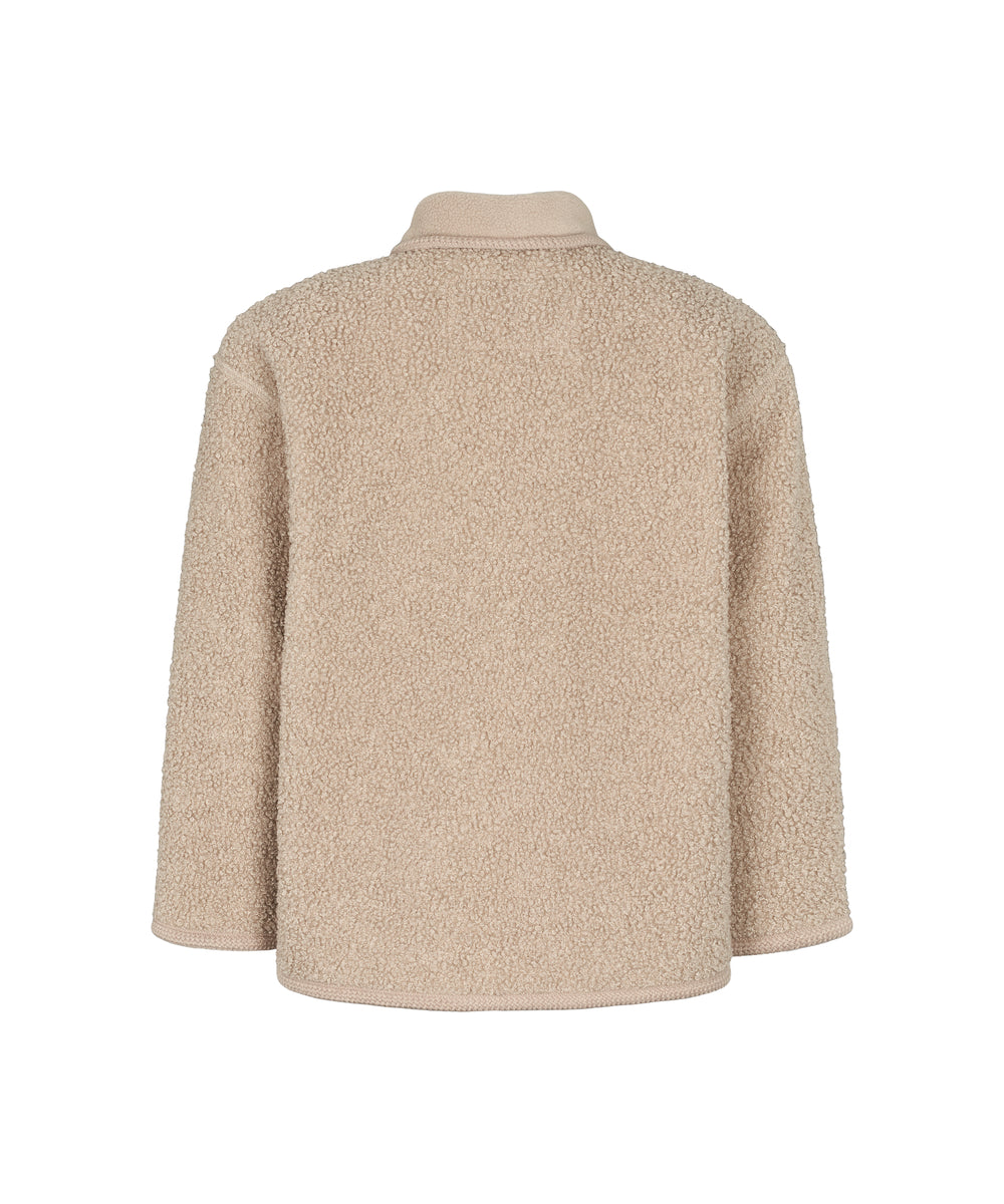 Beige teddytrøje til børn med knapper og stor buet forlomme