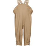 beige regnbukser med seler og fodstropper, set forfra