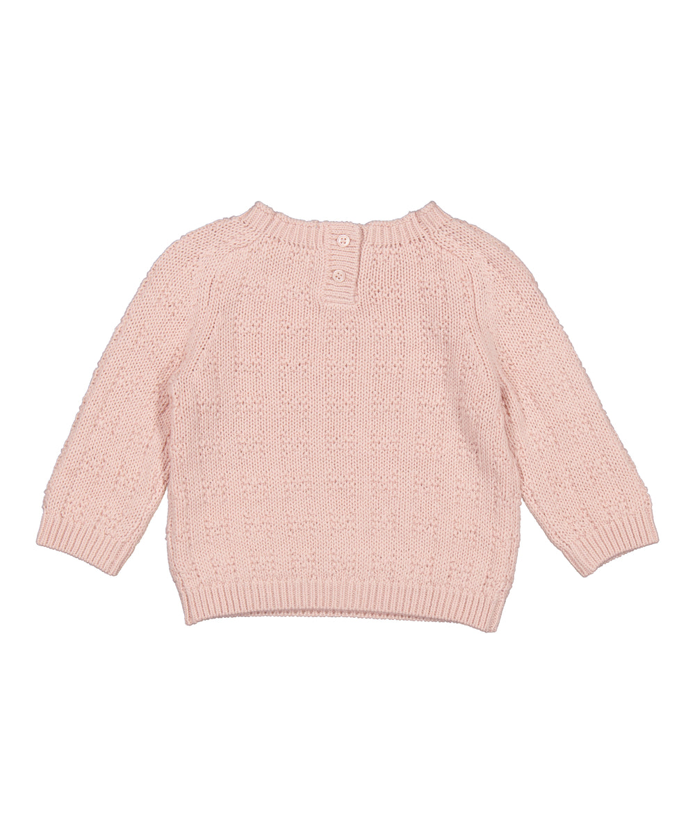 lyserød, strikket babytrøje med rund hals og hulmønster