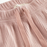 Lyserøde ribstrikkede babybukser med elastisk talje og snor