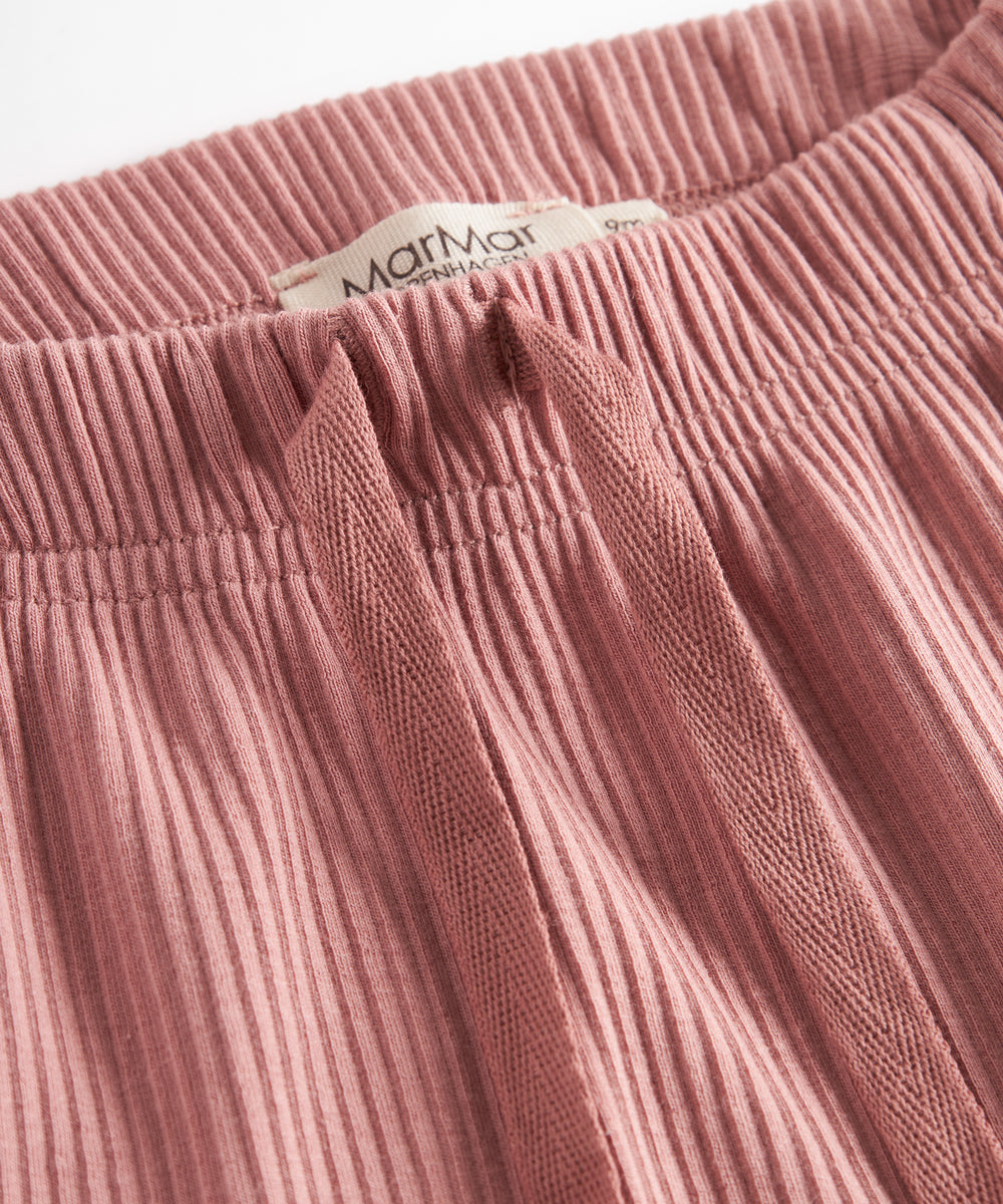 Lyserøde ribstrikkede bukser med snøre i taljen til børn