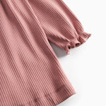 Lyserød kjole med lange ærmer og flæser til børn