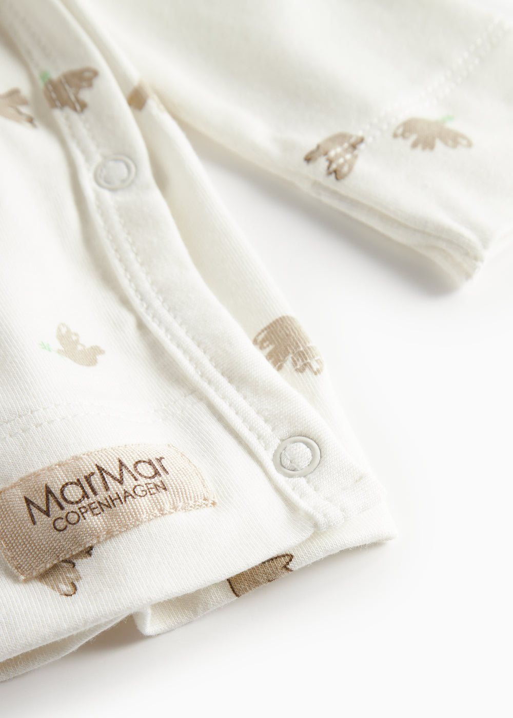 Langærmet bluse til nyfødte med slå-om-lukning og fuglmønster