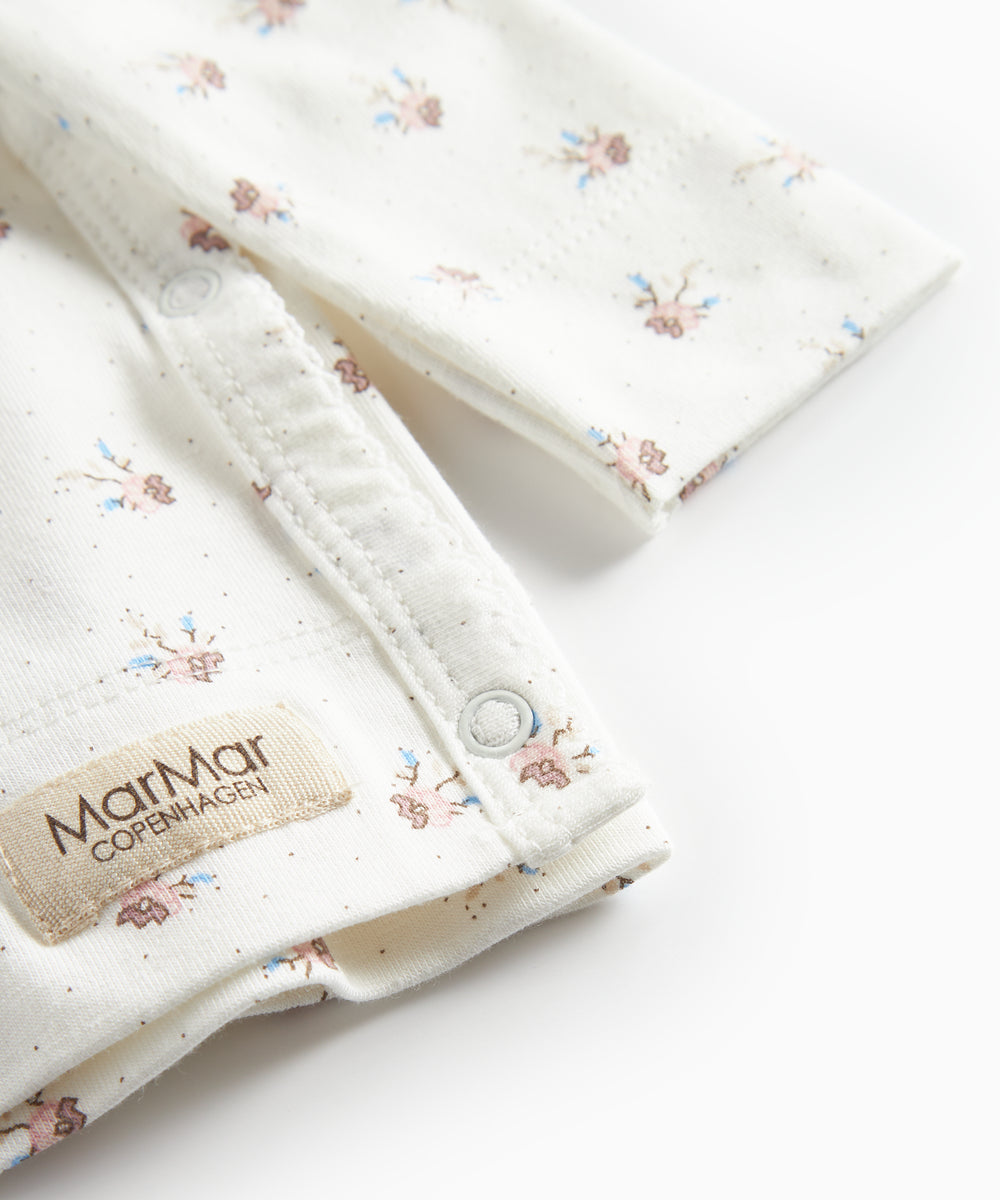 Langærmet bluse til nyfødte med slå-om-lukning og blomstermønster