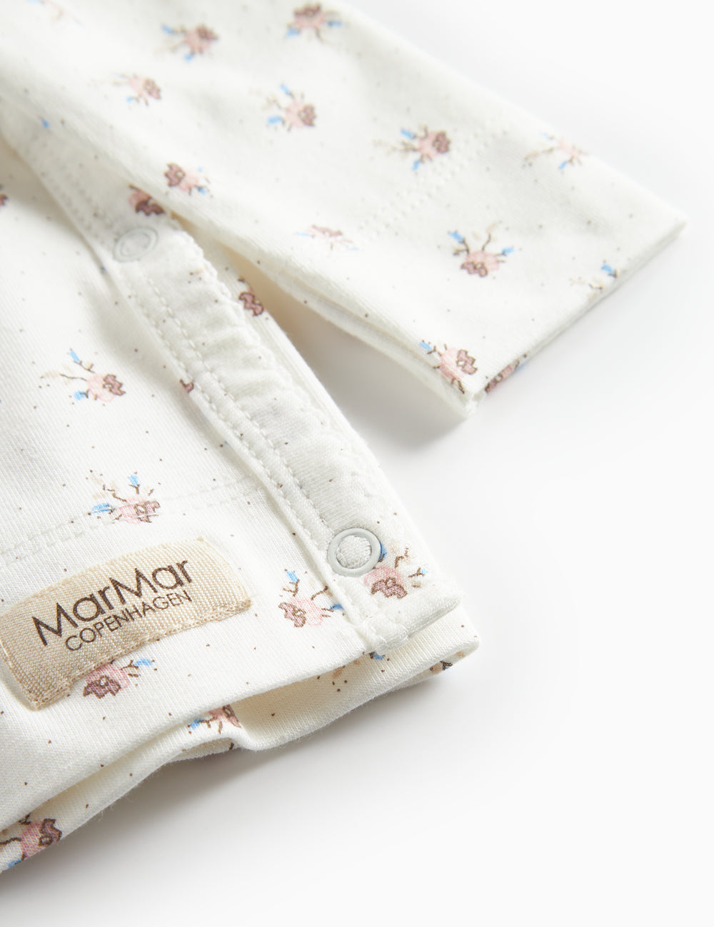 Langærmet bluse til nyfødte med slå-om-lukning og blomstermønster