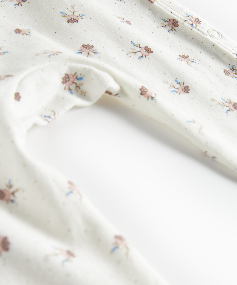 Baby heldragt med blomstermønster