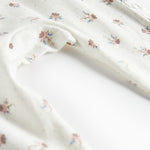 Baby heldragt med blomstermønster