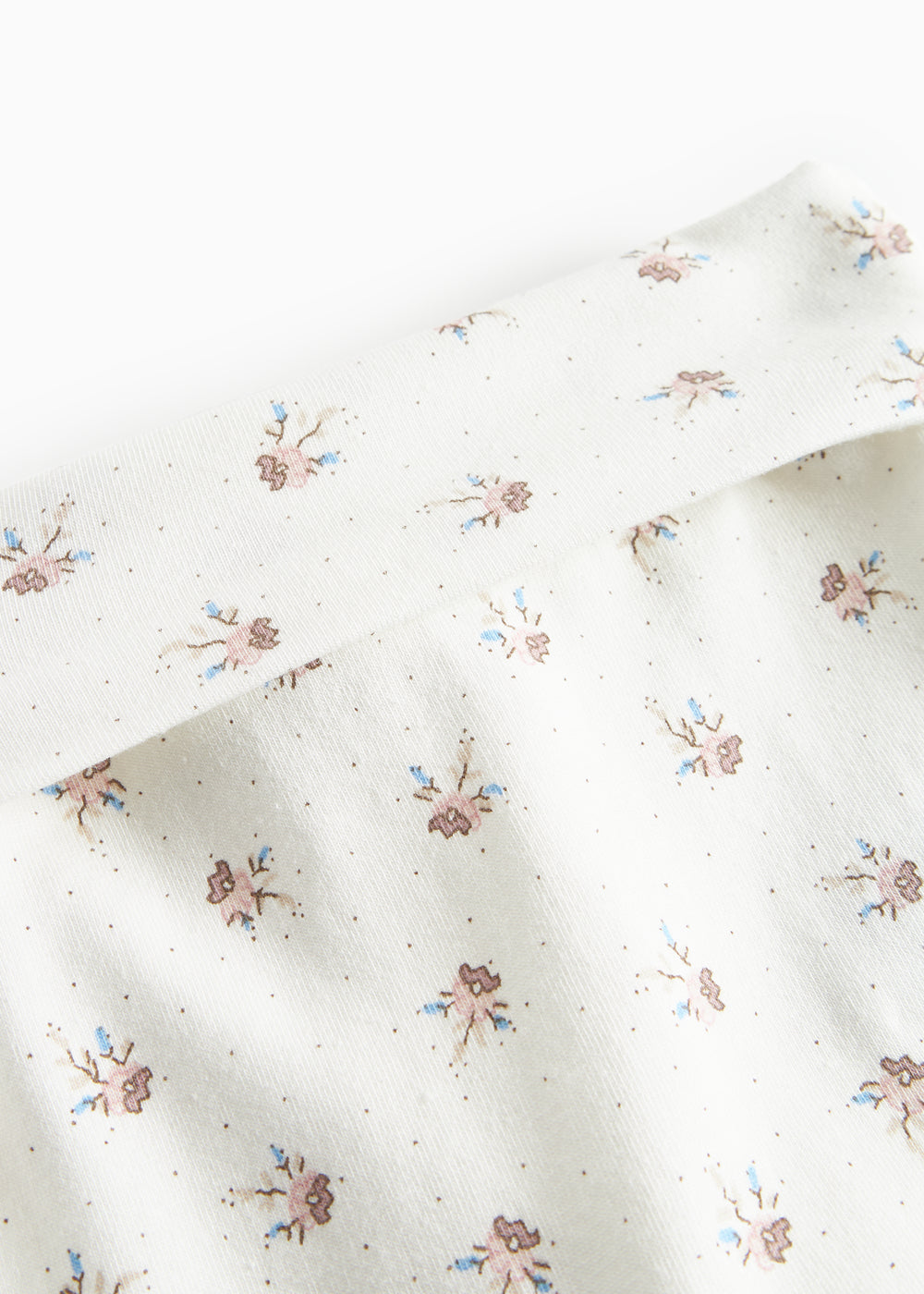 Bløde babybukser med blomstermønster og futter