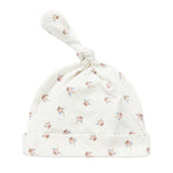 Blød babyhue med mønsterprint og knude på toppen