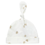 Blød babyhue med mønsterprint og knude på toppen