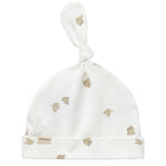 Blød babyhue med mønsterprint og knude på toppen