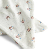 Detaljebillede af blødt stof på bidering