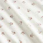 babytæppe med blomstermønster