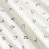 babytæppe med blomstermønster