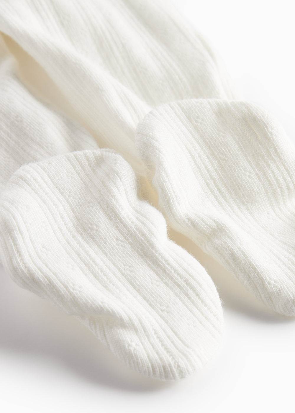 Hvide pointelle bukser med fødder til baby