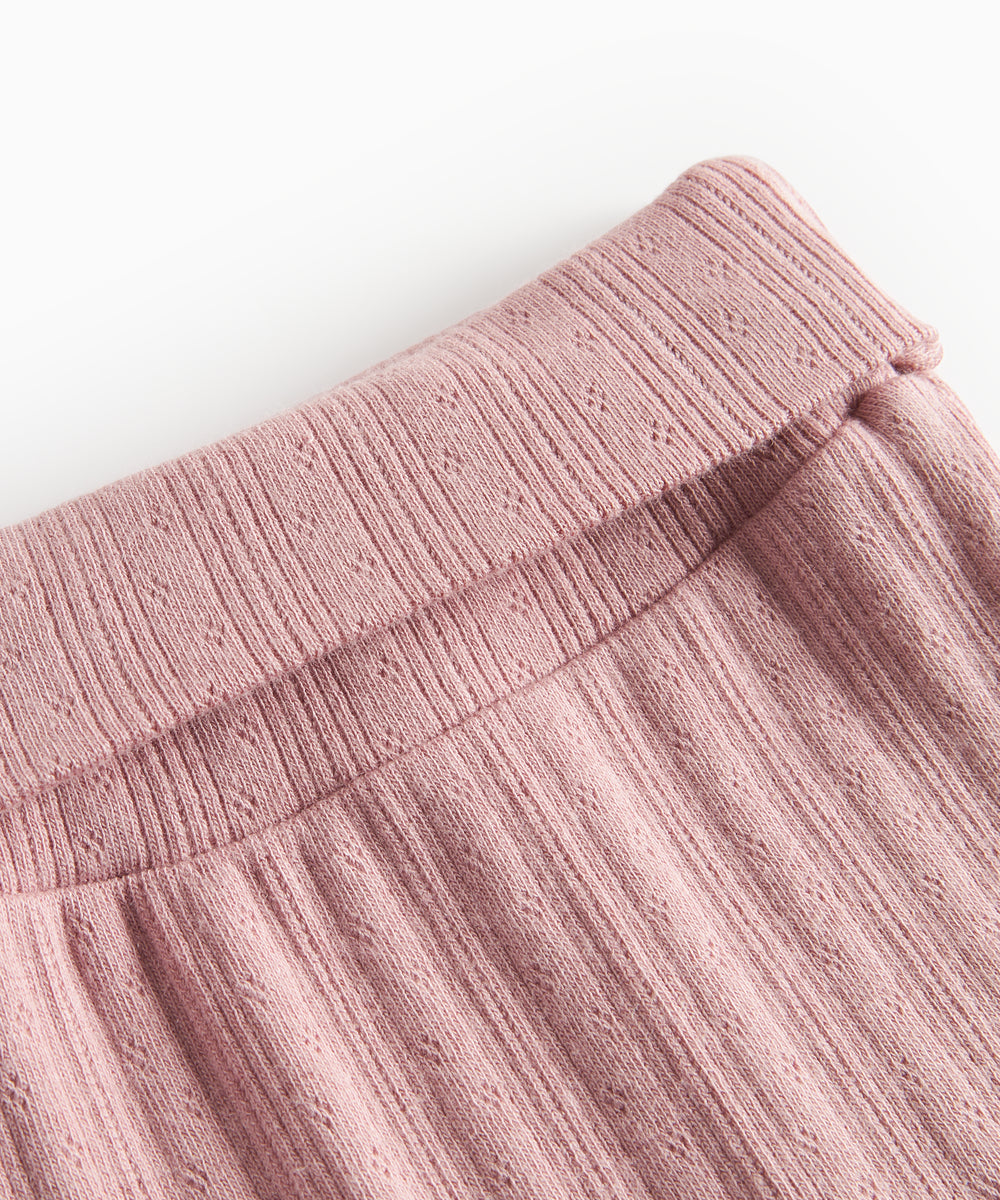 Rosa pointelle bukser til baby med fødder