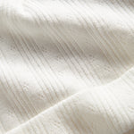 Hvid pointelle hue til baby