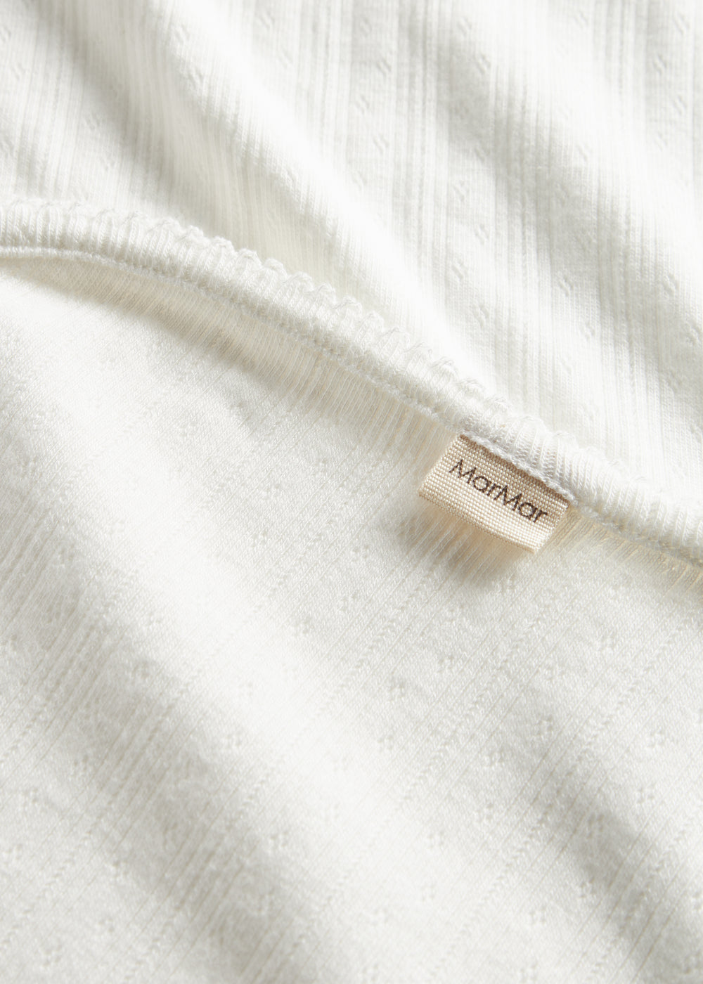 Hvid pointelle babytæppe