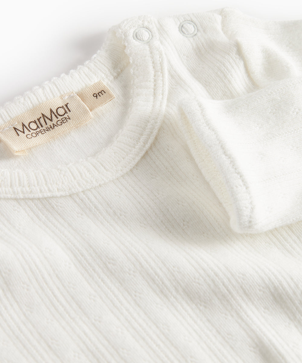 Hvid pointelle body til børn med lange ærmer