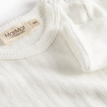 Hvid pointelle body til børn med lange ærmer