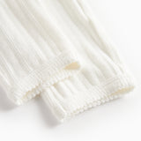 Hvide pointelle bukser til børn med bindebånd og ribkanter