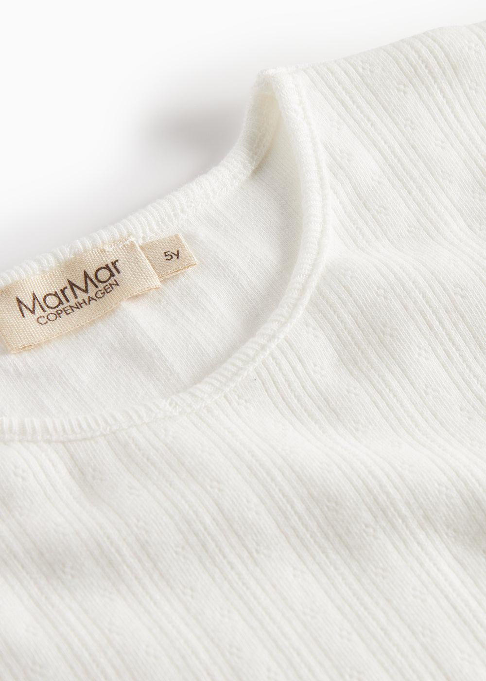 Hvid pointelle bluse til børn med lange ærmer