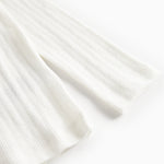 Hvid pointelle bluse til børn med lange ærmer