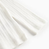 Hvid pointelle bluse til børn med lange ærmer