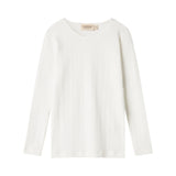 Pige iført rosa pointelle bluse, jakke og tørklæde