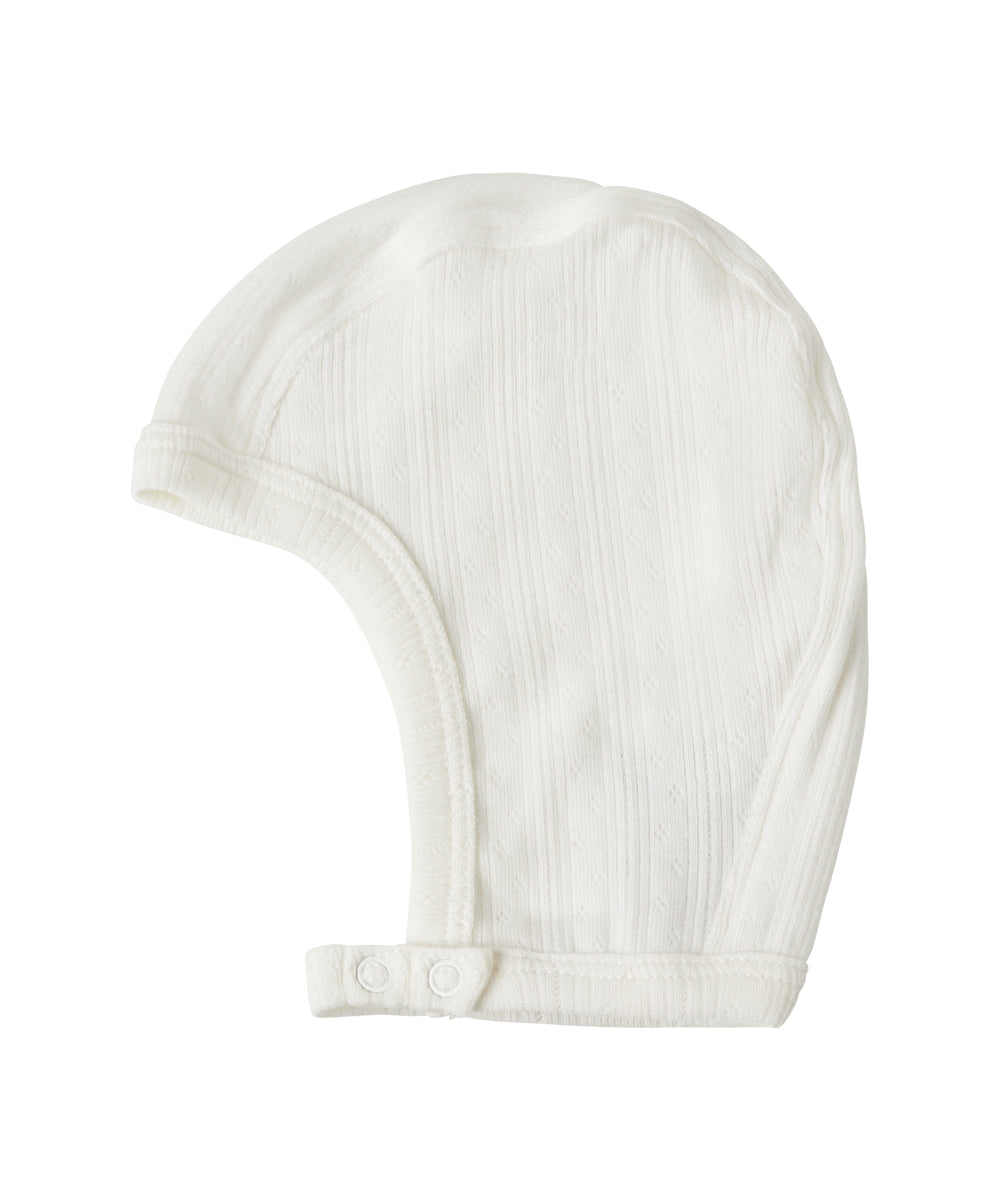 Rosa pointelle hjelm til baby