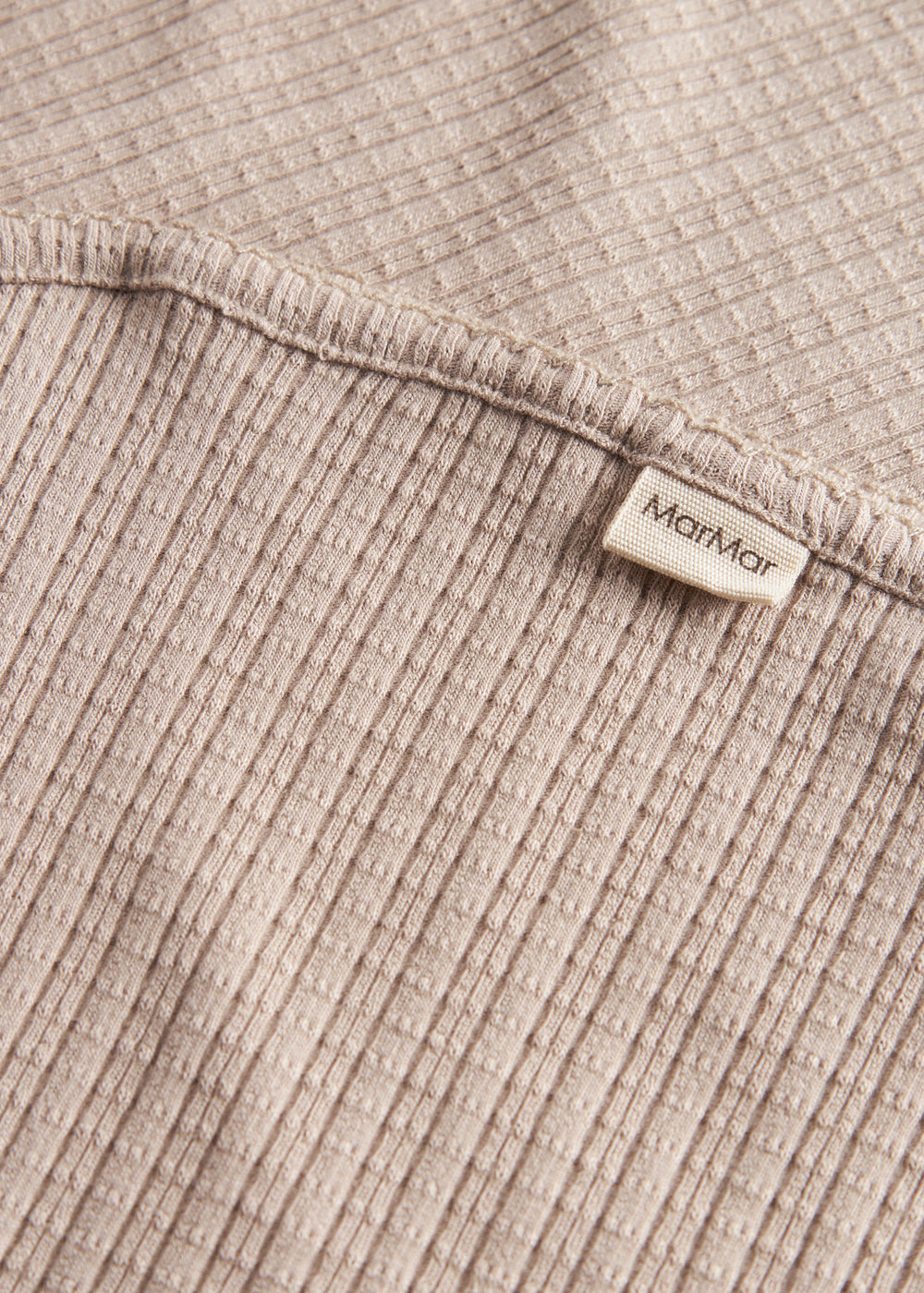 Beige pointelle babytæppe