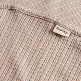 Beige pointelle babytæppe