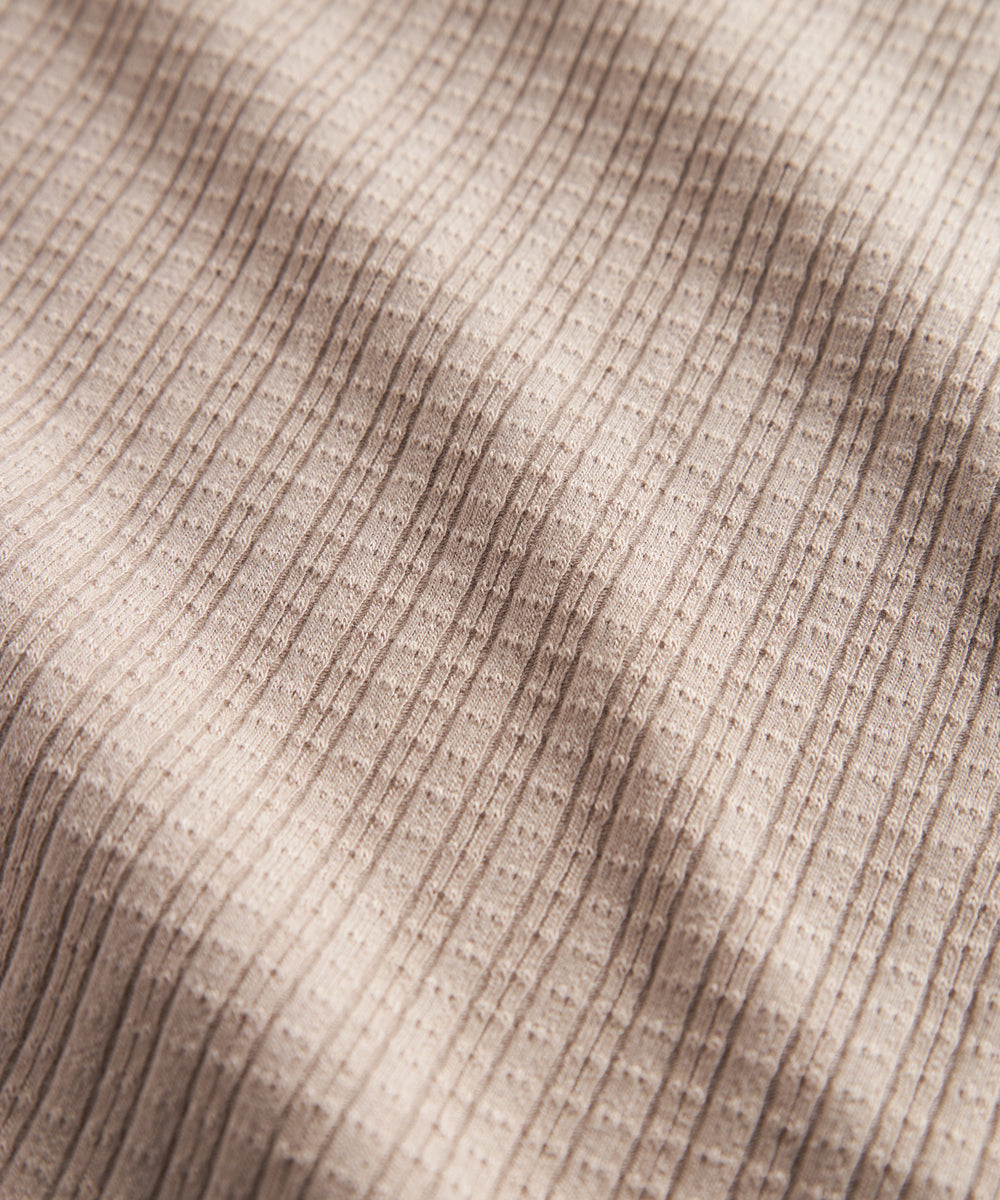 Beige pointelle babytæppe