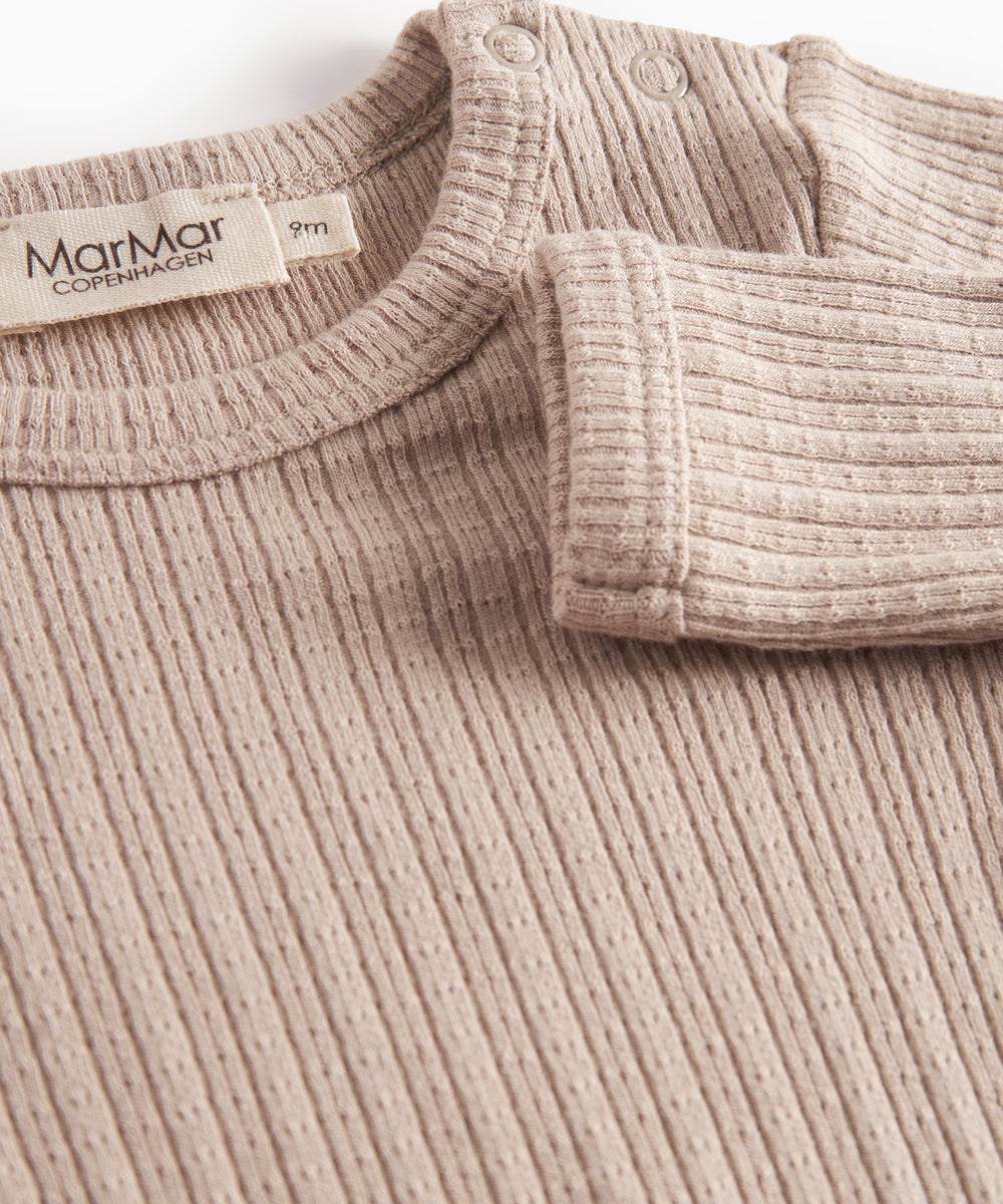 Beige pointelle body med lange ærmer til baby