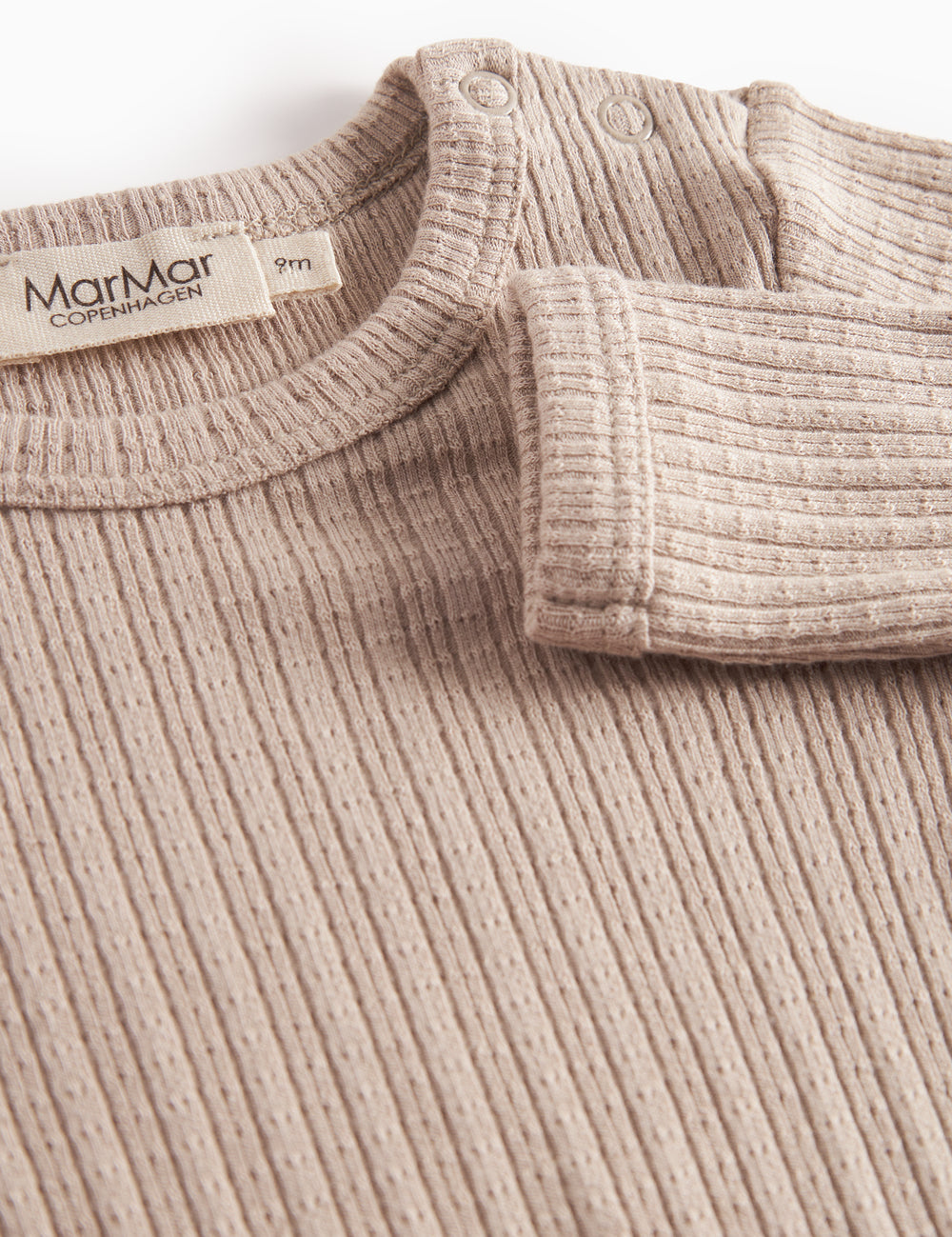 Beige pointelle body med lange ærmer til baby