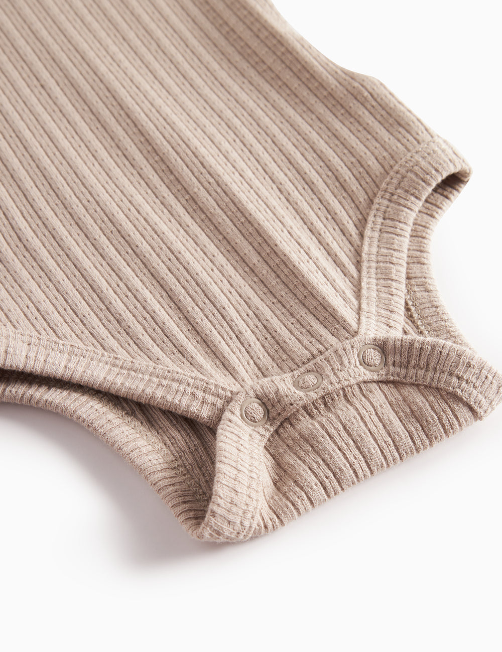 Beige pointelle body med lange ærmer til baby