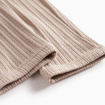 Beige pointelle babybukser med snøre og elastik i taljen